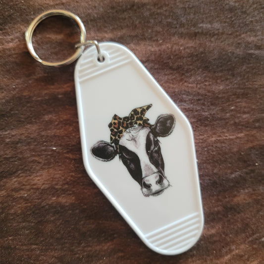 Cow with Leopard Bow Hotel Room Keychain